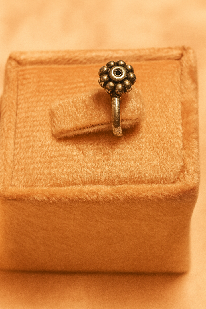 floral-inspired oxidized silver nose pin
