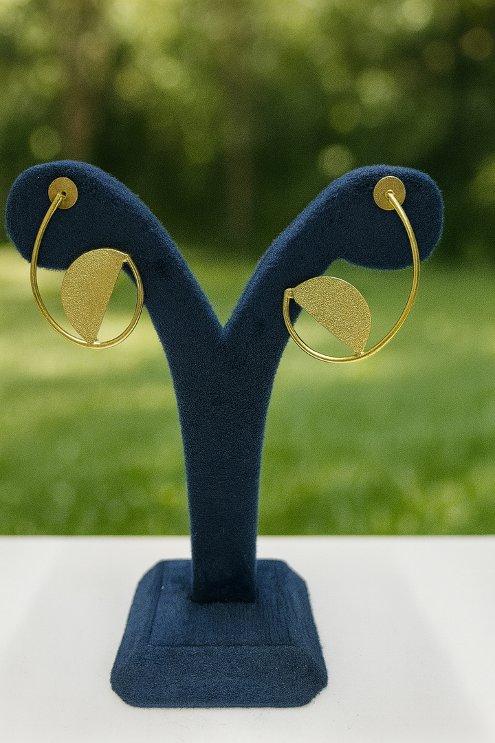 Contemporary Gold Hoop Earrings with Geometric Charm
