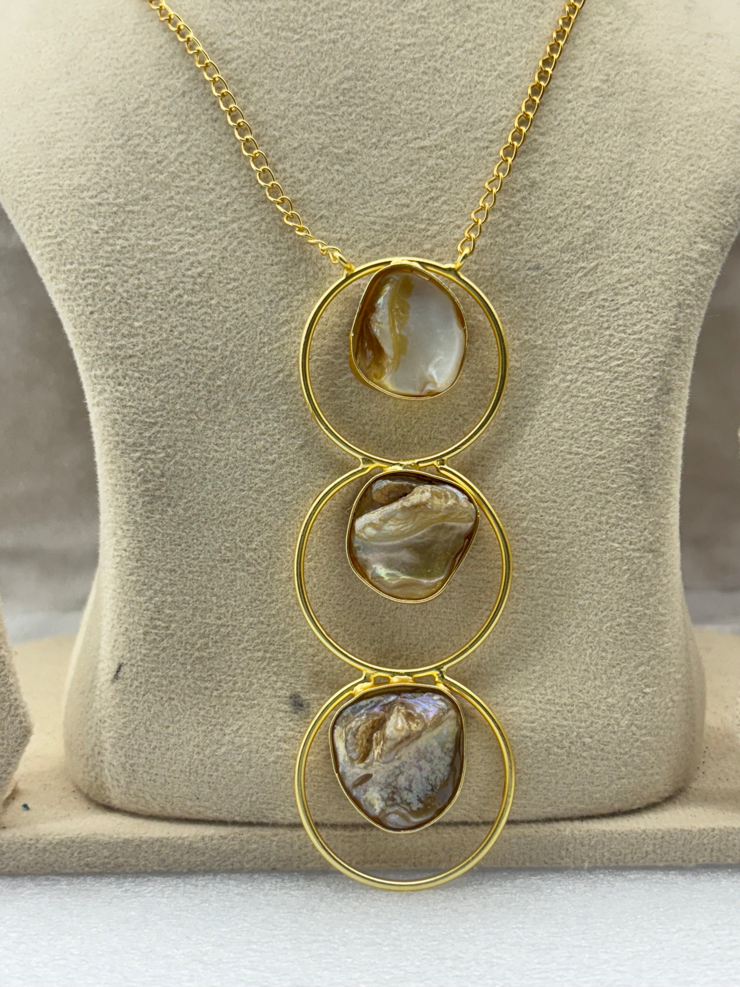 “Amyraa Jewels – Golden Shell Circle Statement Jewelry Set”